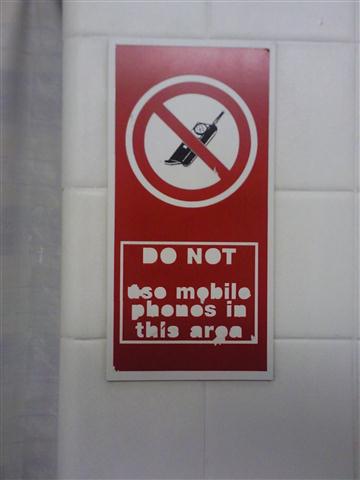 Cubicle mobile phone sign